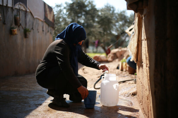 Aisha*, 47, mother of nine children currently residing in a displacement camp

"My life was stable before displacement; despite the many times our village was shelled. I lived in my house with my children, close to my family. This made me feel so safe and comfortable. Whenever life got tough, I could turn to my relatives for help. Our financial situation was good and we had enough to cover our needs," says Aisha, who has been displaced within Idlib. 

Since they fled home, the family has been displaced three more times. Today Aisha works as a daily worker in agricultural fields earning about a dollar and a quarter per day. 

&ldquo;Most of my children had to drop out of school due to financial constraints and the need to work. But also, schools are very far away from the camp and it was very difficult to attend classes.&rdquo; Aisha joins the psychological support group sessions provided by CARE&rsquo;s local Syria Relief and Development Organization, and she also took part in a literacy course that was offered at Syria Relief&rsquo;s center, where she learned to read and write.

"I just wish and hope to return to my home and family and see us all together gathered around one table like we used to. I also hope to receive aid to be able to start my own project, especially now that funding for humanitarian aid is expected to be reduced. I am very worried about the future. I believe that the reduction of humanitarian aid will only lead to increased theft and famine.&rdquo;

*Names have been changed to protect identities.

Background:13 Years of War, Displacement, and Crisis in Northwest Syria: Three Women's Wishes

As the Syria conflict enters its 13th year, the humanitarian situation in the northwest of the country continues to deteriorate. A few months after the February 2023 earthquakes, communities have grappled with shortages of humanitarian funding and a renewed escalation of violence, which has further deepened the suffering of over 4 million people. Due to the shortage of funding, humanitarian actors, including CARE, are needing to prioritize one vulnerable life over another while communities witness ongoing food shortages and continued inflation in food prices, which is making four out of five Syrians in northwest Syria food insecure.

On March 15, only five days into the holy month of Ramadan, it will be exactly 13 years after the start of the Syrian conflict. How do people cope with the constantly deteriorating living conditions? How do they receive Ramadan this year? What do they miss the most? We talked to three women currently residing in northwest Syria to find out.

&nbsp;