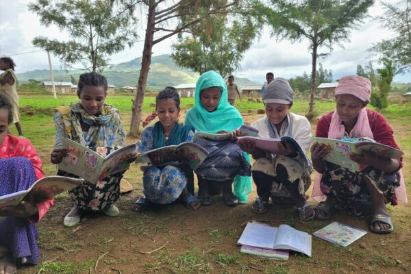 CARE initiated girls&rsquo; groups in communities that teach girls through different discussion sessions about life skills. The girls come together and sit on small stones in a big circle. They come together and study their workbooks and discuss about social norms in ther community. They gain self-confidence and learn how to negotiate and to stand up for themselves. Eyerus, a member of a girls group aged 10 to 14 negotiated with her father until he agreed to cancel a proposal that he already agreed to. Tadella, 14, a member of the group, was very shy before she joined this group, now she learnt how to speak up.